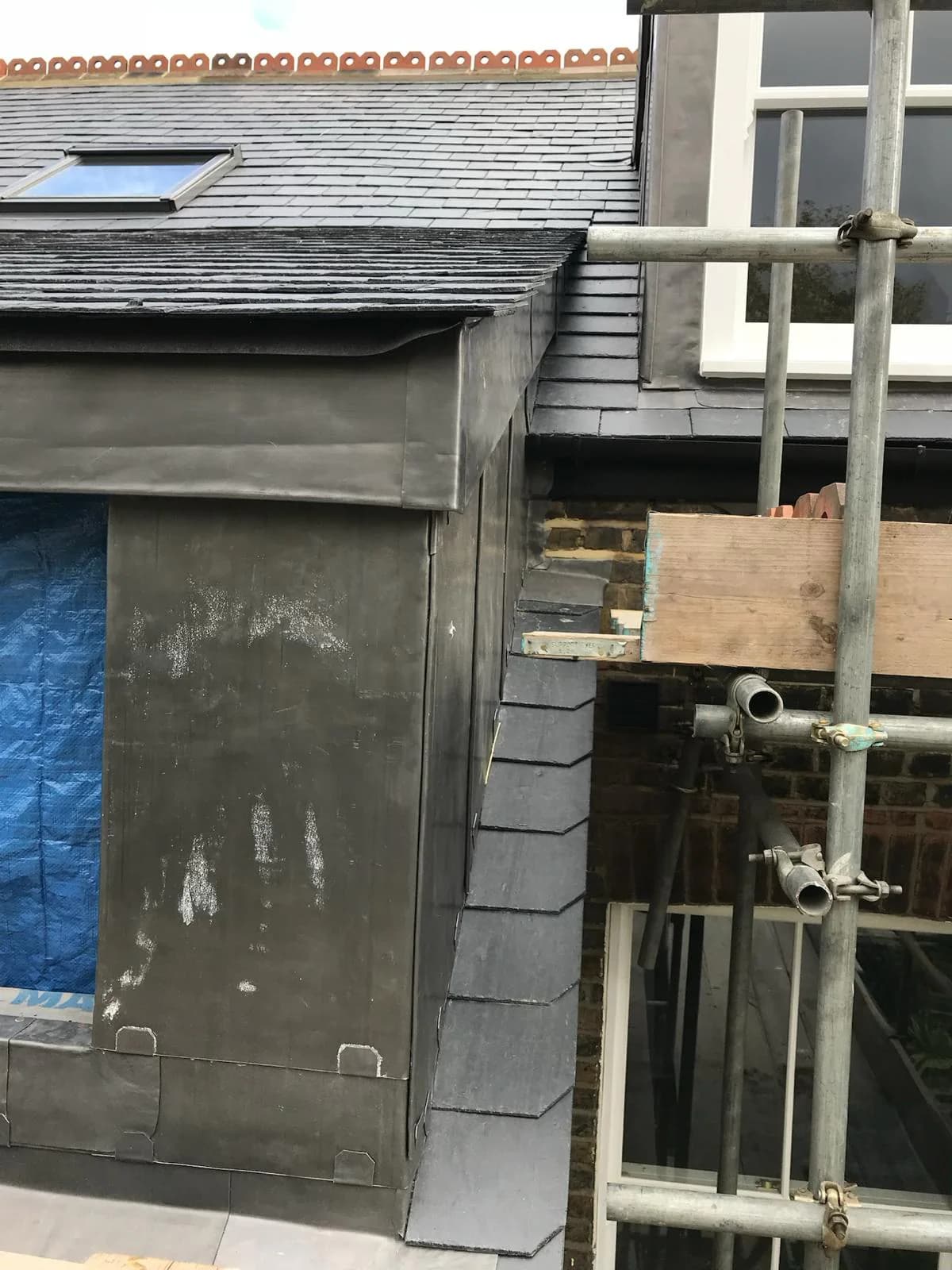 Completed traditional lead flashing in Stock